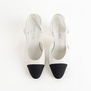 SOLD— Chanel White + Black Round Toe Slingback Heels